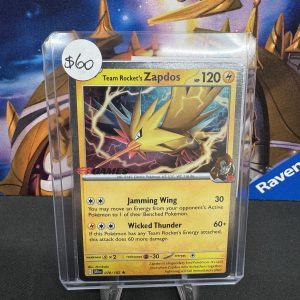 Team Rockets Zapdos 070/182 EB Games Stamp Sealed Promo Pokemon card